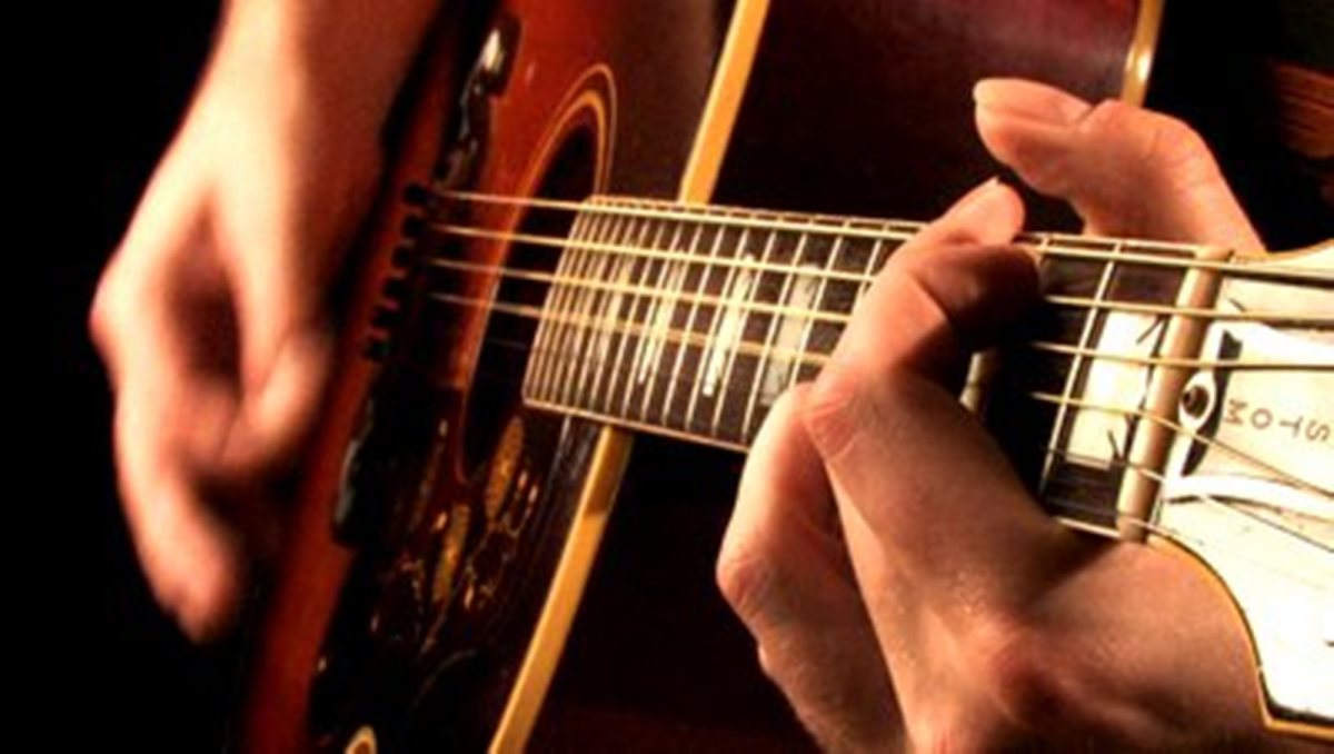 strumming-acoustic-guitar
